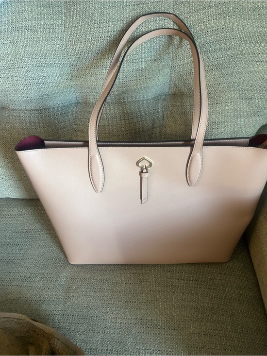 kate spade Handbags - kate spade Pale Pink Leather Tote with Heart Charm Brand New